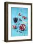 Sliced Pomegranate and a Glass of Pomegranate Juice on Turquoise Wooden Table-Jana Ihle-Framed Photographic Print