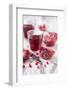 Sliced Pomegranates, Cores and Glass with Pomegranate Juice-Jana Ihle-Framed Photographic Print