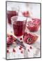Sliced Pomegranates, Cores and Glass with Pomegranate Juice-Jana Ihle-Mounted Photographic Print
