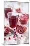 Sliced Pomegranates, Cores and Glass with Pomegranate Juice-Jana Ihle-Mounted Photographic Print