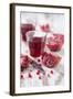 Sliced Pomegranates, Cores and Glass with Pomegranate Juice-Jana Ihle-Framed Photographic Print