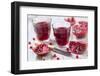 Sliced Pomegranates, Cores and Glasses with Pomegranate Juice-Jana Ihle-Framed Photographic Print