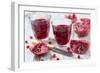 Sliced Pomegranates, Cores and Glasses with Pomegranate Juice-Jana Ihle-Framed Photographic Print