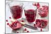 Sliced Pomegranates, Cores and Glasses with Pomegranate Juice-Jana Ihle-Mounted Photographic Print
