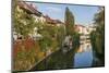 Slovenia, Ljubljana. Vines and trees provide a lush urban corridor along the Ljubljanica River.-Brenda Tharp-Mounted Photographic Print