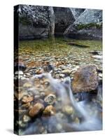 Slow Exposure of Water Flowing Below Vernal Falls with Granite Boulders in the Background.-Ian Shive-Stretched Canvas