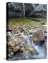 Slow Exposure of Water Flowing Below Vernal Falls with Granite Boulders in the Background.-Ian Shive-Stretched Canvas