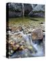 Slow Exposure of Water Flowing Below Vernal Falls with Granite Boulders in the Background.-Ian Shive-Stretched Canvas