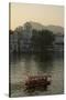 Small boat on Lake Pichola, Udaipur, Rajasthan, India.-Inger Hogstrom-Stretched Canvas