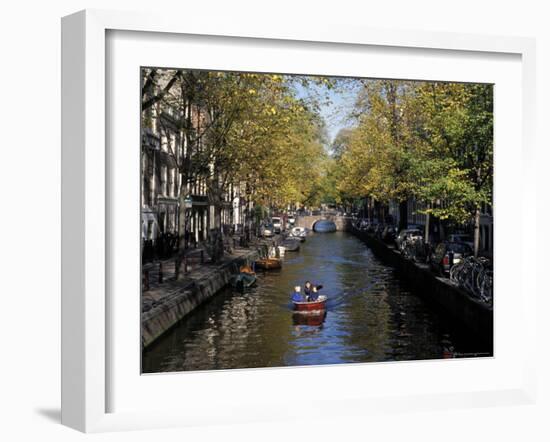 Small Boat on Tree-Lined Oudezijds Achtenburg Wal Canal in the Autumn, Amsterdam, the Netherlands-Richard Nebesky-Framed Photographic Print