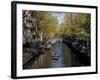 Small Boat on Tree-Lined Oudezijds Achtenburg Wal Canal in the Autumn, Amsterdam, the Netherlands-Richard Nebesky-Framed Photographic Print