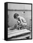 Small Boy Catching Fish with a Net-null-Framed Stretched Canvas