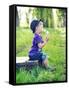 Small Boy Sitting On An Old Suitcase-conrado-Framed Stretched Canvas