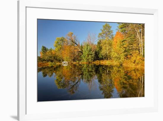 Small bridge and autumn colors reflected on tranquil pond, New Hampshire-Adam Jones-Framed Photographic Print