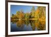 Small bridge and autumn colors reflected on tranquil pond, New Hampshire-Adam Jones-Framed Photographic Print