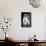Small Dog Sitting-Tim Kahane-Photographic Print displayed on a wall
