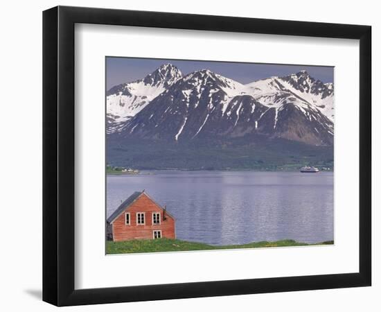 Small Farm Building with Mountains, Harstad, Norway-Walter Bibikow-Framed Photographic Print