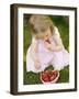 Small Girl Eating Strawberries on Grass-null-Framed Photographic Print