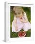 Small Girl Eating Strawberries on Grass-null-Framed Photographic Print