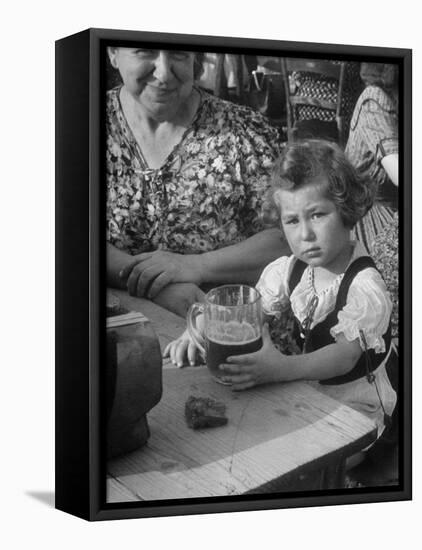 Small Girl Enjoying a Stein of Weak Beer-Dmitri Kessel-Framed Stretched Canvas