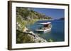 Small Gulet Boat in Craggy Cove-Stuart Black-Framed Photographic Print