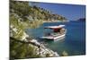 Small Gulet Boat in Craggy Cove-Stuart Black-Mounted Photographic Print