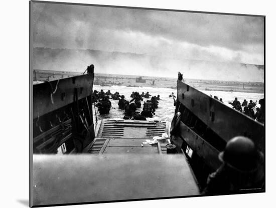 Small Landing Craft with American Soldiers Wading Ashore under Heavy German Fire-Robert F^ Sargent-Mounted Photographic Print