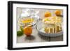 Small Orange Cake with White Icing on Wooden Table-Jana Ihle-Framed Photographic Print