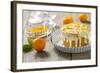 Small Orange Cake with White Icing on Wooden Table-Jana Ihle-Framed Photographic Print