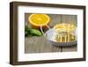 Small Orange Cake with White Icing on Wooden Table-Jana Ihle-Framed Photographic Print