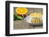 Small Orange Cake with White Icing on Wooden Table-Jana Ihle-Framed Photographic Print