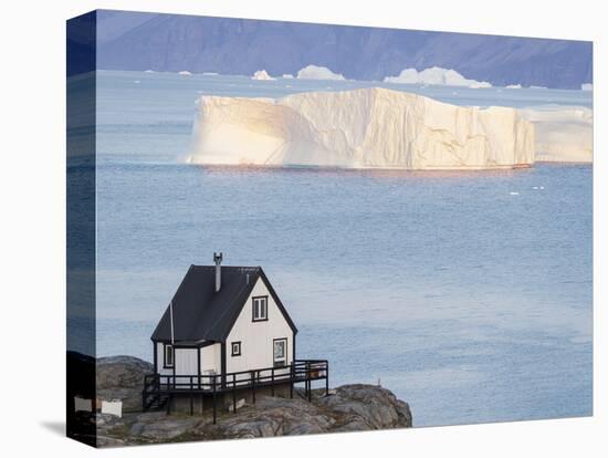 Small town of Uummannaq, northwest Greenland. Background the glaciated Nuussuaq Peninsula.-Martin Zwick-Stretched Canvas