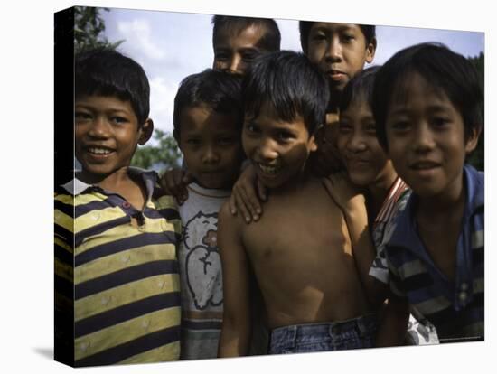Smiling Children, Indonesia-Michael Brown-Stretched Canvas