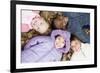 Smiling Children Lying on Autumn Leaves-Ian Boddy-Framed Photographic Print