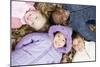 Smiling Children Lying on Autumn Leaves-Ian Boddy-Mounted Photographic Print