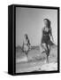 Smiling Girls Carrying Skis Out of the Water onto Beach-null-Framed Stretched Canvas