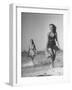 Smiling Girls Carrying Skis Out of the Water onto Beach-null-Framed Photographic Print