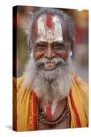 Smiling sadhu with Vishnu mark on his forehead, Rishikesh, Uttarakhand, India-Godong-Stretched Canvas