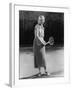 Smiling Woman Playing Tennis-null-Framed Photo