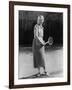 Smiling Woman Playing Tennis-null-Framed Photo