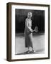 Smiling Woman Playing Tennis-null-Framed Photo