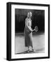 Smiling Woman Playing Tennis-null-Framed Photo