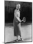 Smiling Woman Playing Tennis-null-Mounted Photo