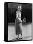 Smiling Woman Playing Tennis-null-Framed Stretched Canvas