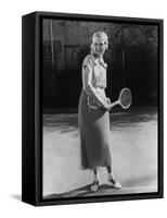 Smiling Woman Playing Tennis-null-Framed Stretched Canvas