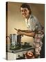 Smiling Woman Preparing a Wholesome Feast-null-Stretched Canvas