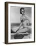 Smiling Young Woman Perches on a Stone Wall in a Striped Bikini-Charles Woof-Framed Photographic Print