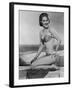 Smiling Young Woman Perches on a Stone Wall in a Striped Bikini-Charles Woof-Framed Photographic Print