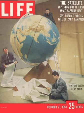 https://imgc.allpostersimages.com/img/posters/smithsonian-observatory-scientists-working-at-m-i-t-to-calculate-sputnik-s-orbit-october-21-1957_u-L-Q1IV5LG0.jpg?artPerspective=n