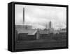 Smoke Billowing from Chimneys in Factory Town-Emil Otto Hopp?-Framed Stretched Canvas
